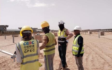 Engineers wearing protective equipment on site